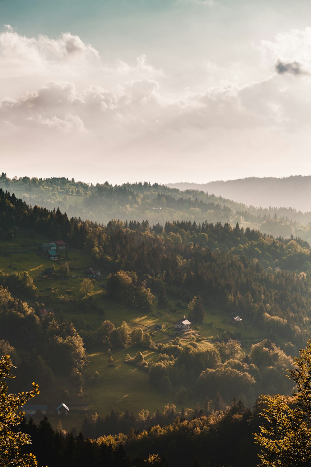 high angle view of trees under clouds