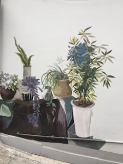 A colorful mural depicting cannabis and art.