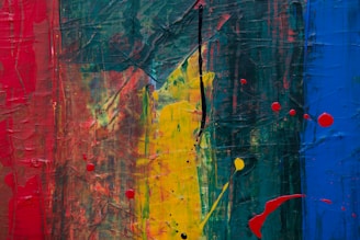 yellow, red, and green abstract paintng