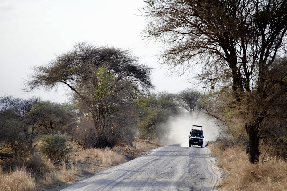 time lapse photography of vehicle on road