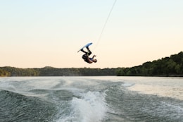 man surfing on waves