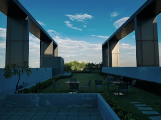 A modern rooftop garden with minimalist design and elegant plants.