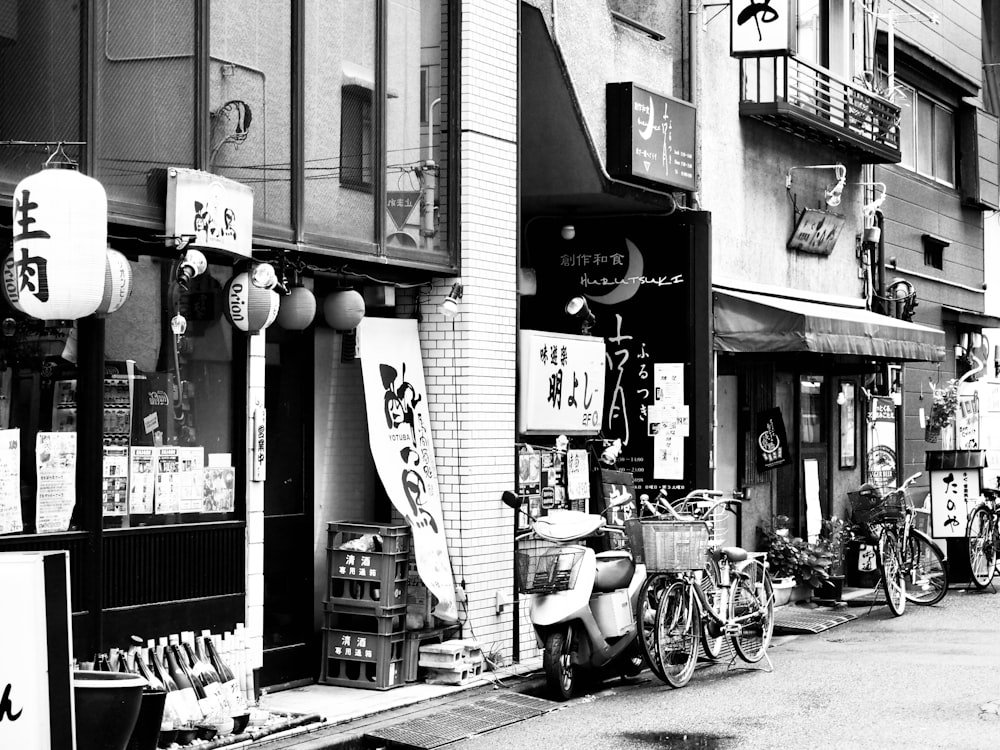 grayscaled photo of store front