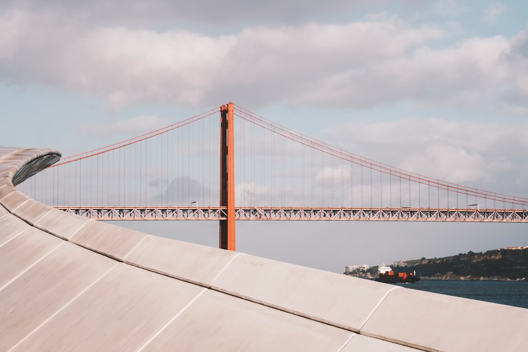 Suspension bridge photo spot MAAT Cristo Rei