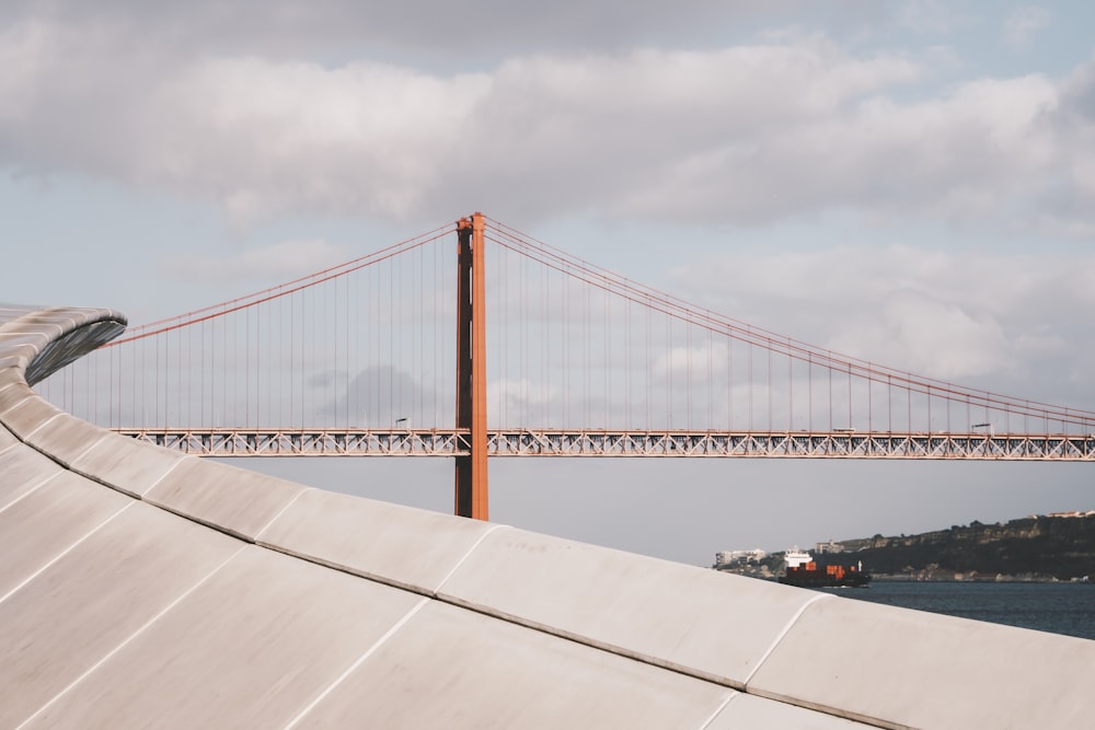 a view of a bridge over a body of water