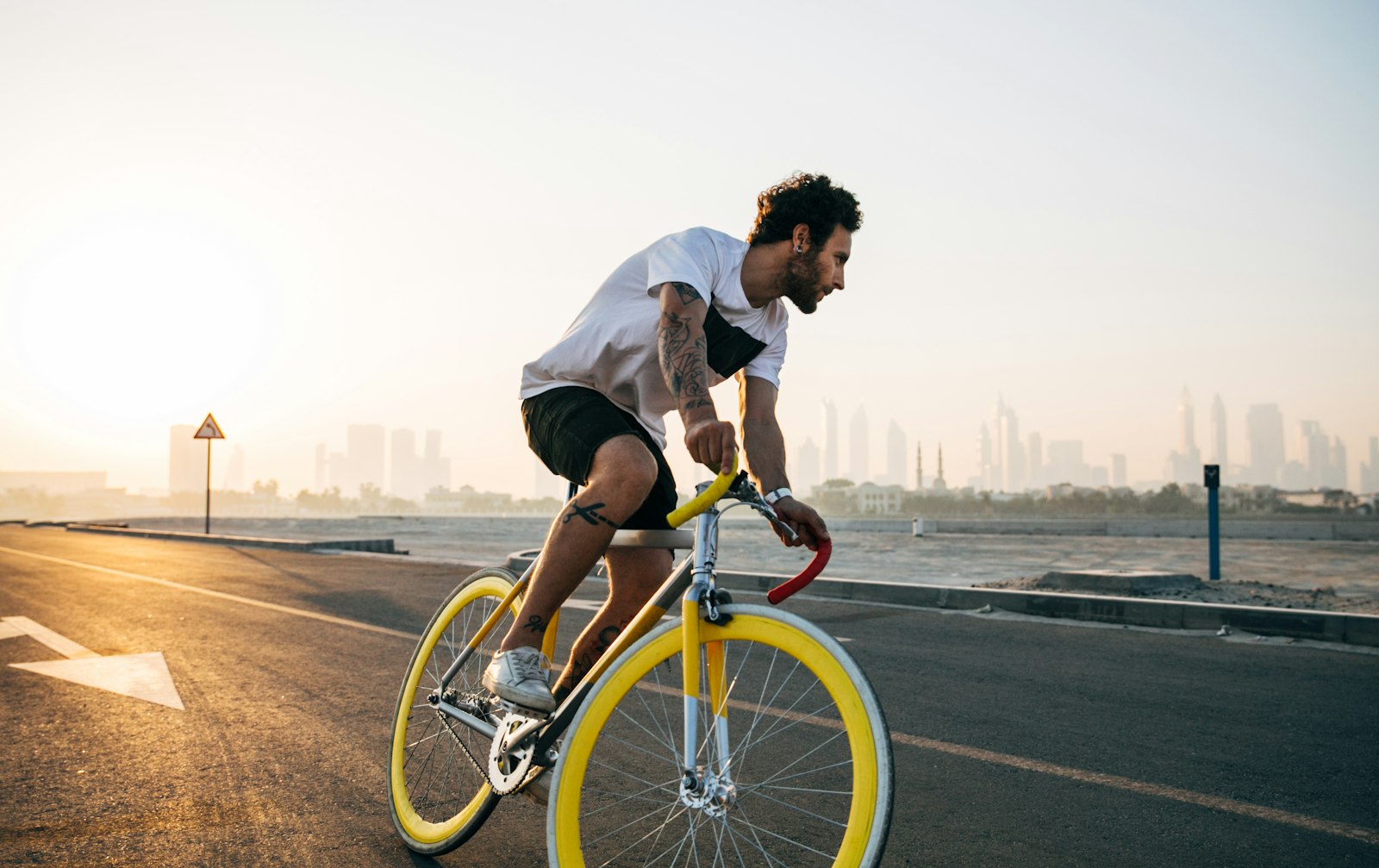 Cyclist riding a bike on a road — reference imagery for the blog section