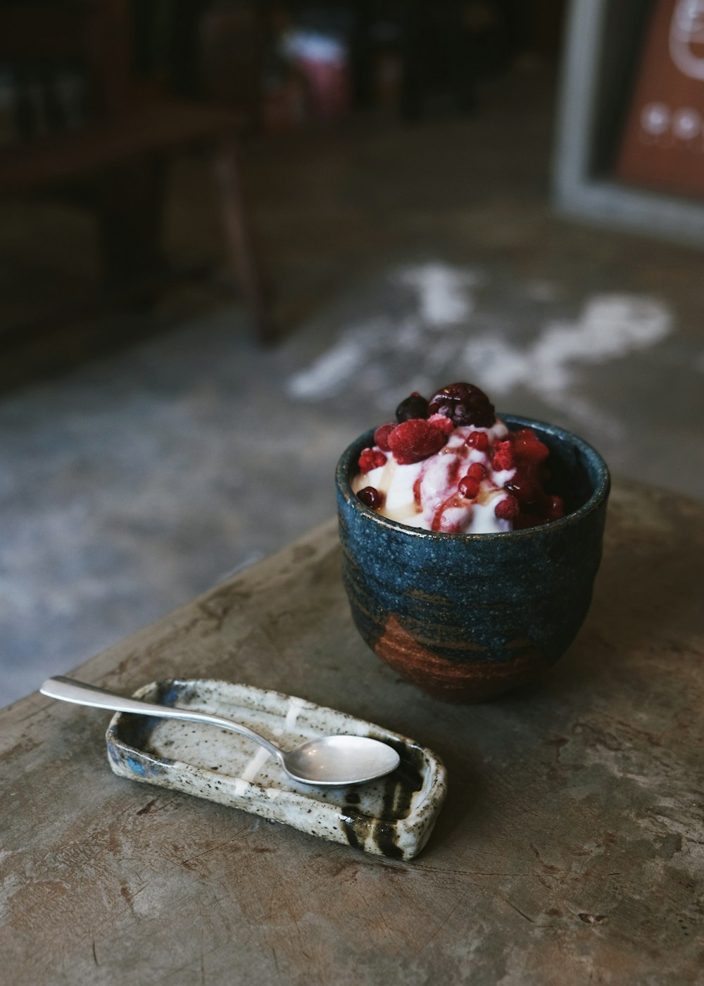 Ice cream with berries in bowl