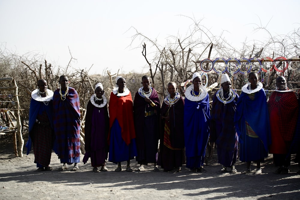 group of people wearing traditional robe