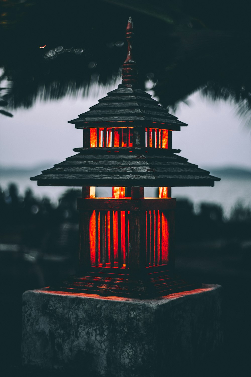 red outdoor lamp on post