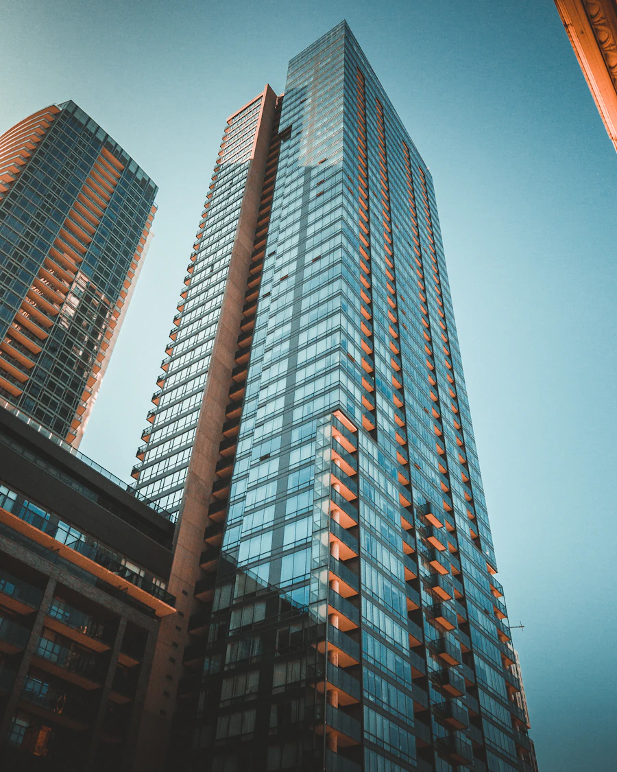 Glass condo tower exterior, Toronto-area skyline