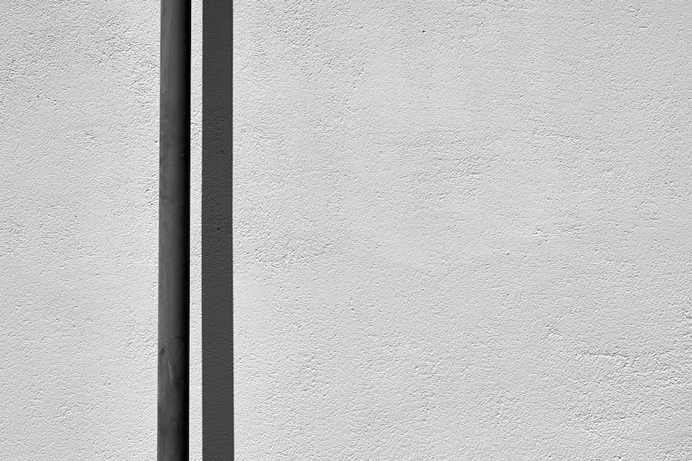 a black and white photo of a street sign