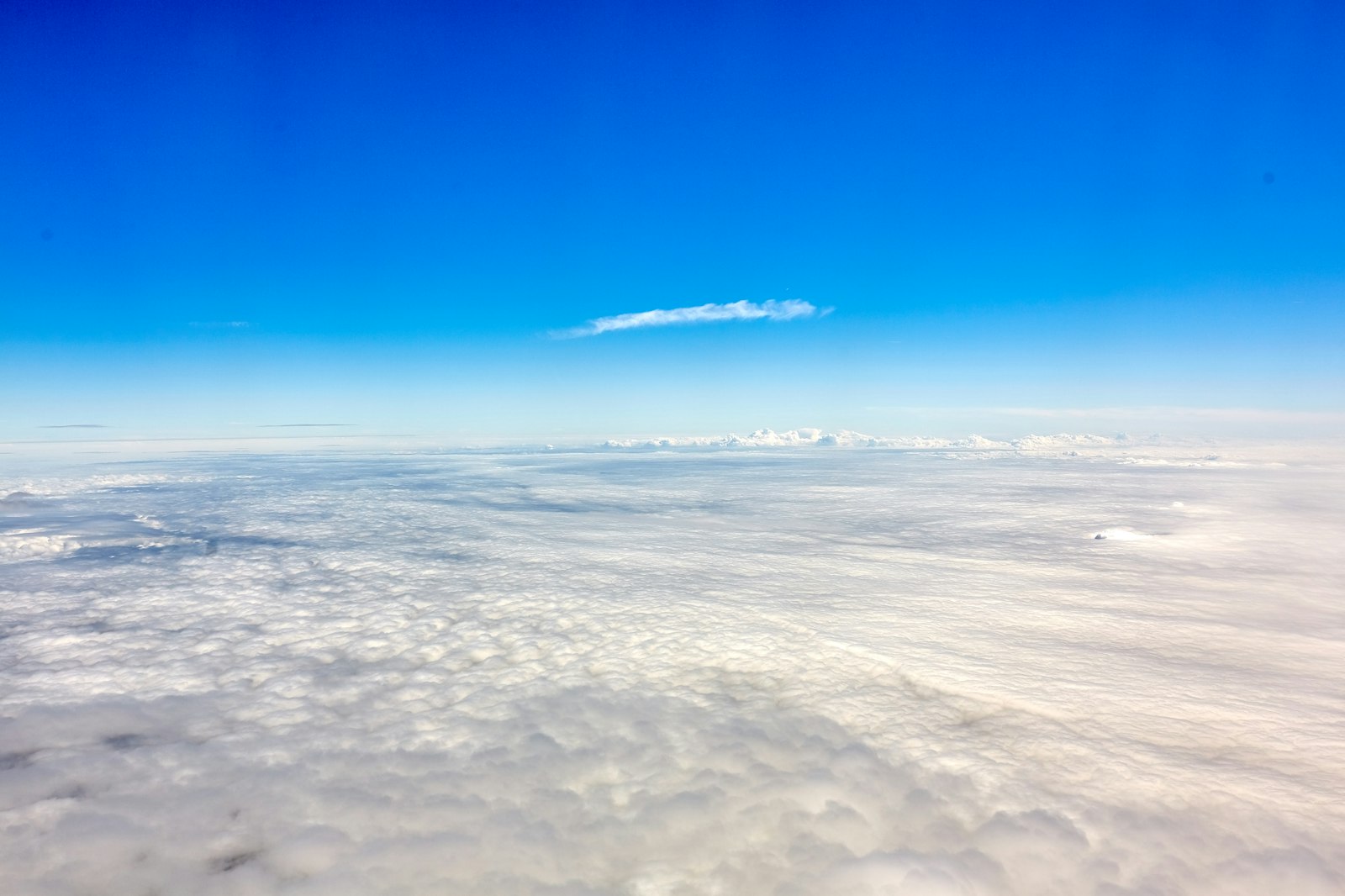 Sigma 35mm F1.4 DG HSM Art sample photo. Clouds under blue sky photography