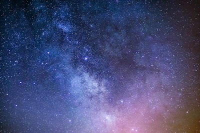 Night sky with shooting stars representing daily horoscope practices