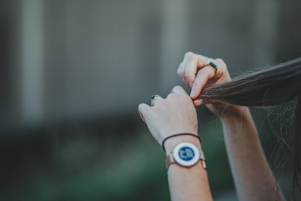 woman holding hair