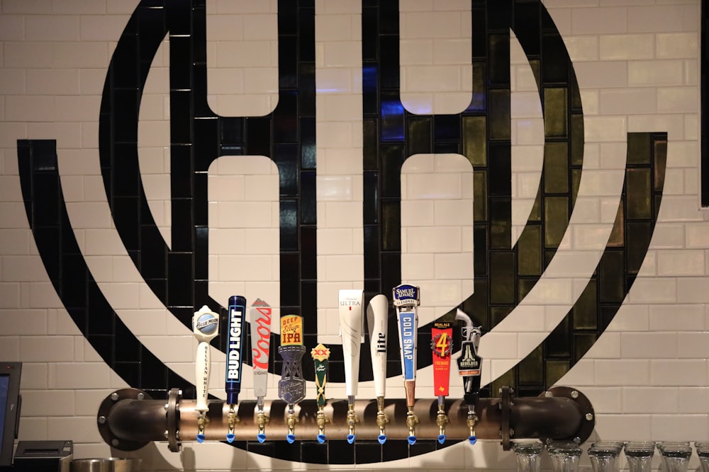 assorted-color beer tap handles
