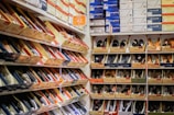 assorted pairs of shoes on boxes