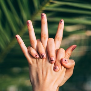 selective focus photography of person's hands