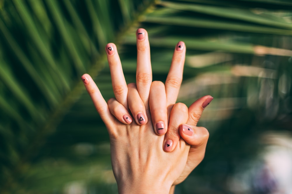 selective focus photography of person's hands