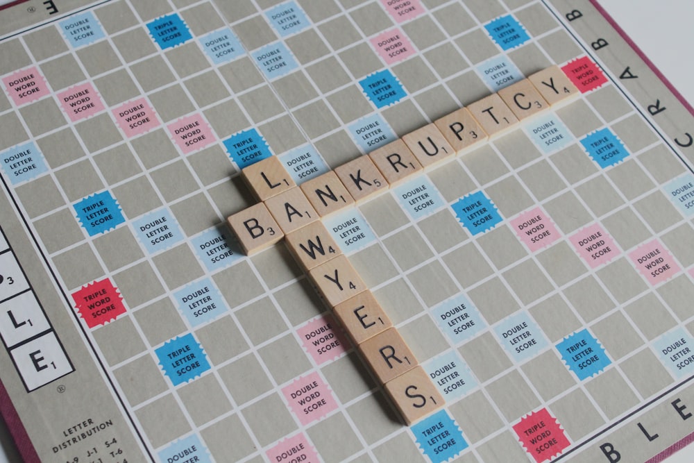 closeup photo of scrabble game board