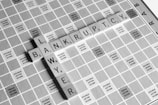 gray scale photography of Lawyer Bankruptcy scrabbles tiles