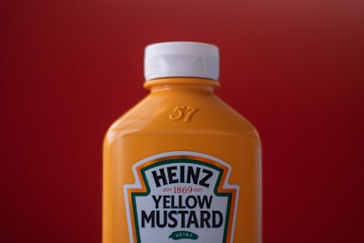 heinz yellow mustard bottle sauce teams background
