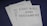 A stack of documents on a dark surface, with the top page clearly labeled 'Last Will and Testament' in bold letters. The documents appear to be legal papers, suggesting importance and formality.