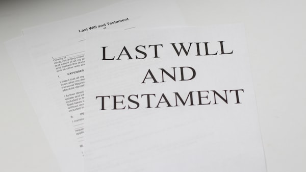 Legal documents and pen on a desk for Islamic will and wasiyyah planning