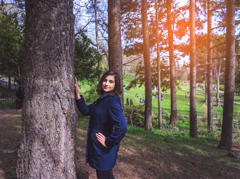 woman standing near tree