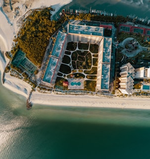 top-view photography of resort near coastline