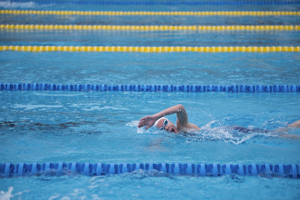 woman swimming on pool