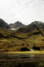 Commercials production companies: white house at the foot of a mountain during the daytime