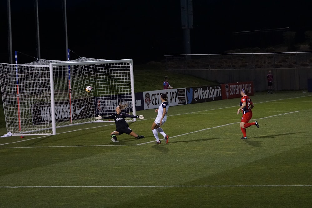 soccer player making goal