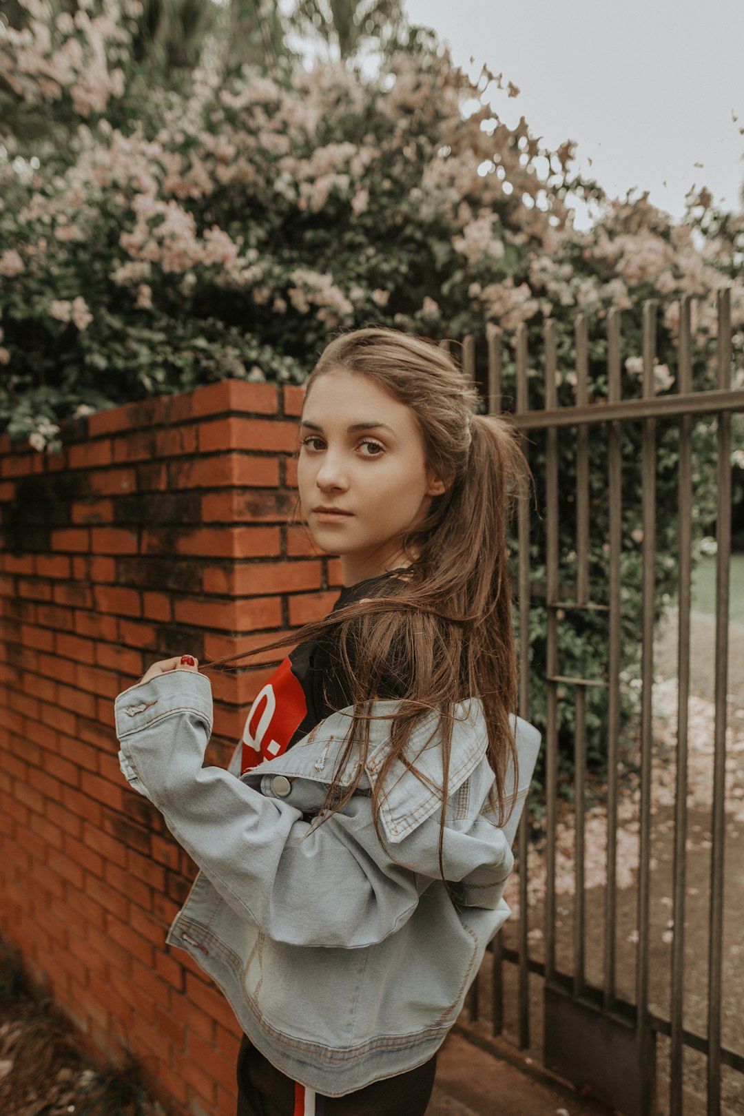 Woman Standing Near Black Metal Gate Photo  Free Person Image On Unsplash-1568