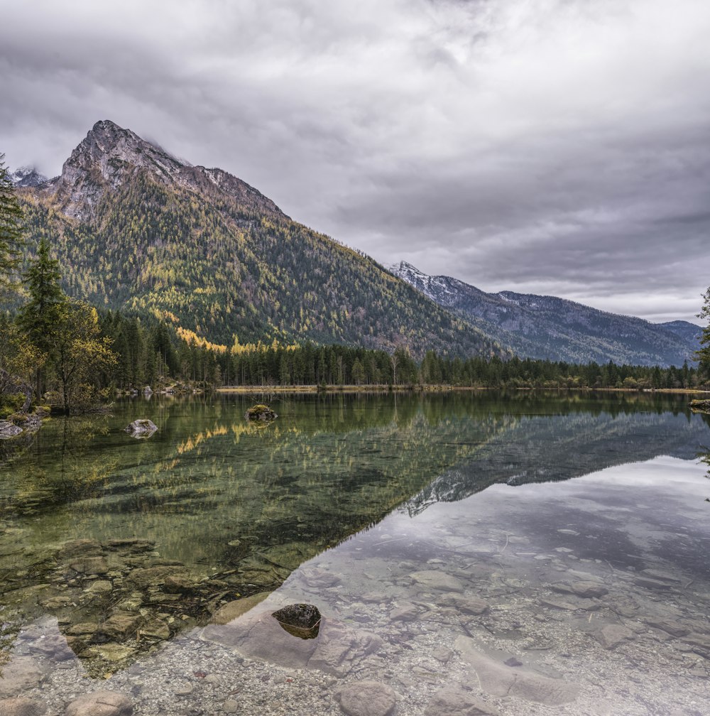 mountain reflecting on body of water