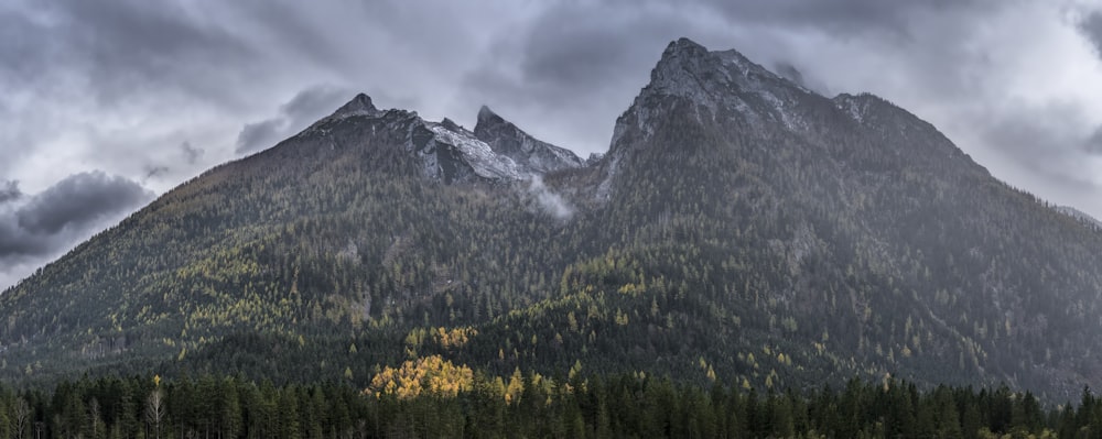 green mountain under white cloud