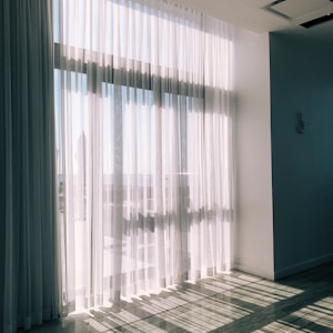 white glass panel curtains