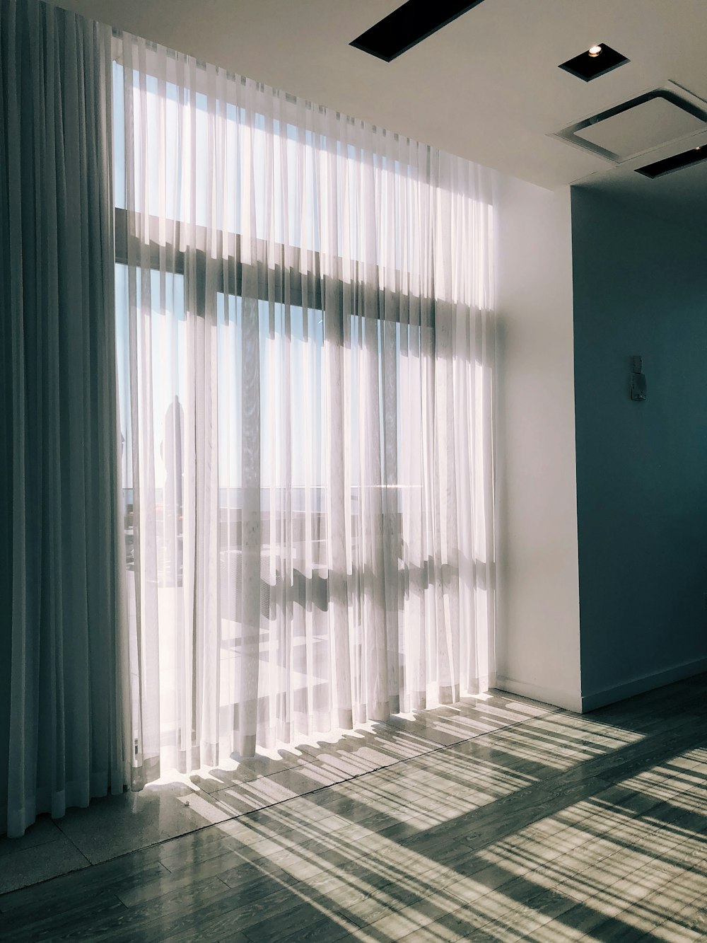 white glass panel curtains