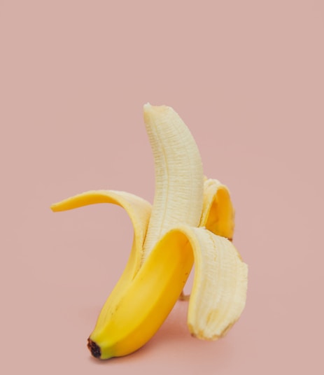 half peeled banana fruit