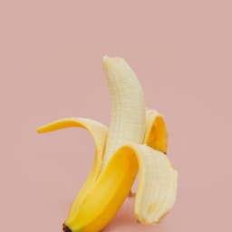half peeled banana fruit