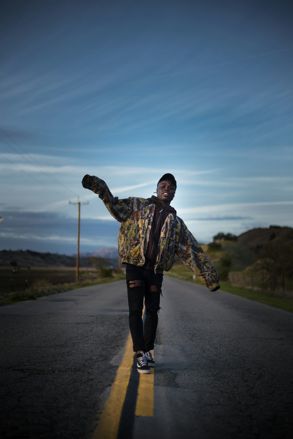 man walking on street