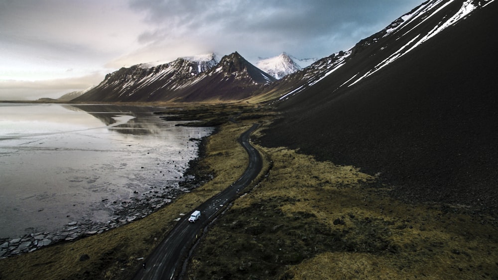 mountains near body of water