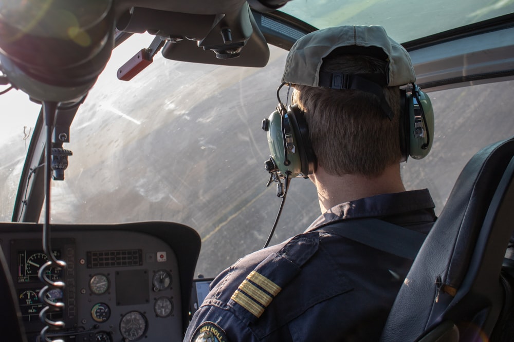 man driving helicopter