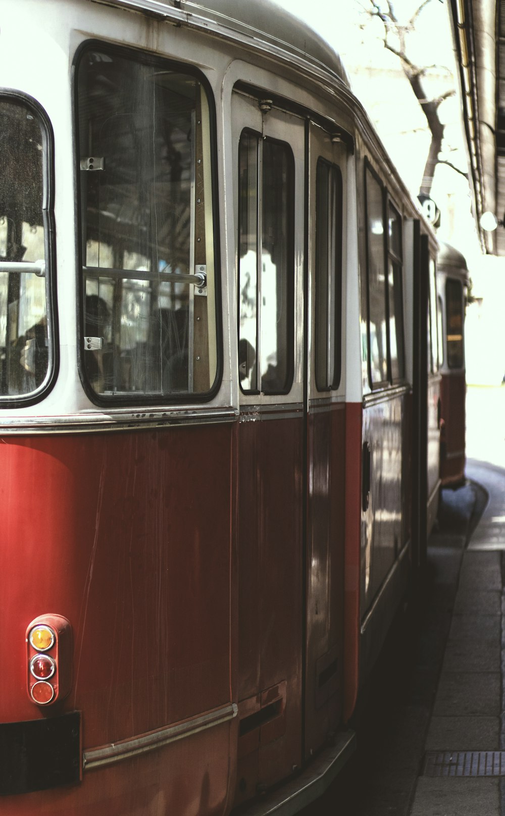 red and white train on subway