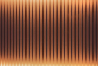 Learn how Exodus & Resilience empowers migrant voices through art. Striped background