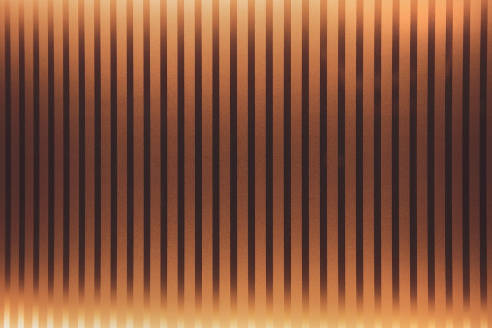 a brown and white striped background with a black stripe