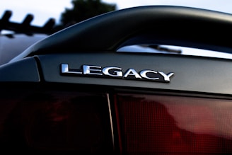 black and red car in close up photography