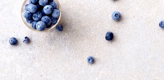 blueberries in clear glass bowl