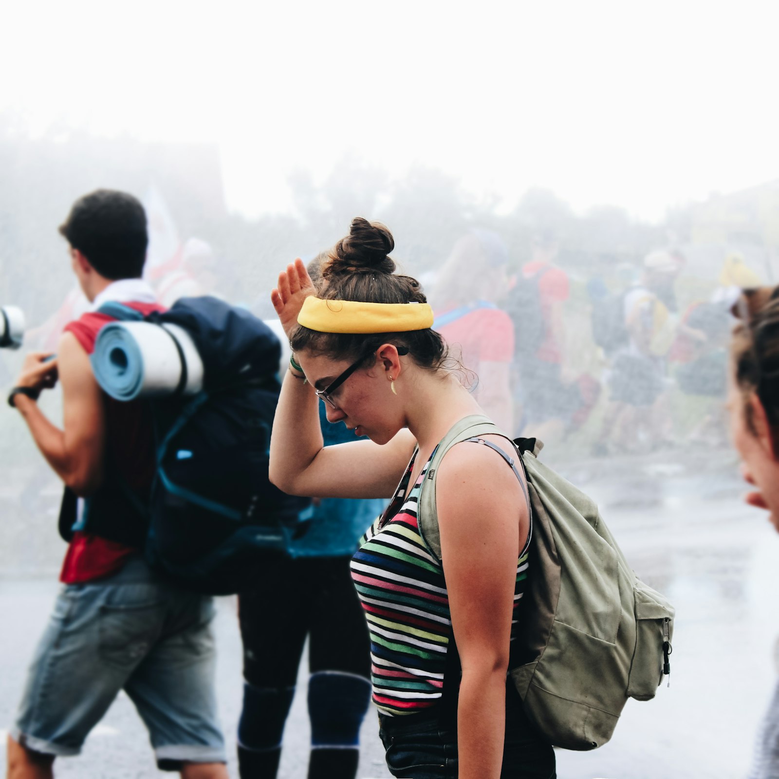 Canon EOS 600D (Rebel EOS T3i / EOS Kiss X5) sample photo. Woman carrying backpack beside photography