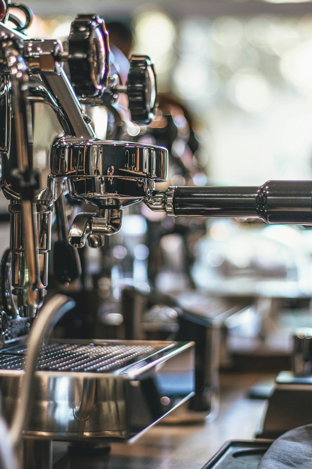 selective focus photography of espresso maker