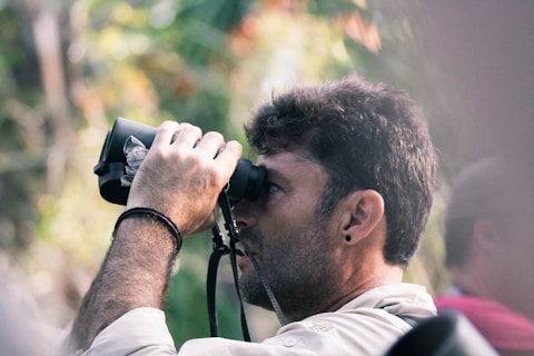 man using black binoculars-Best MBA specialization for future